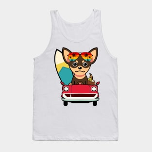 Cute small dog driving to the beach Tank Top